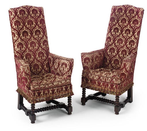 A PAIR OF WALNUT ARMCHAIRS