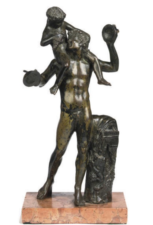 AN ITALIAN BRONZE GROUP OF A FAUN AND THE INFANT BACCHUS