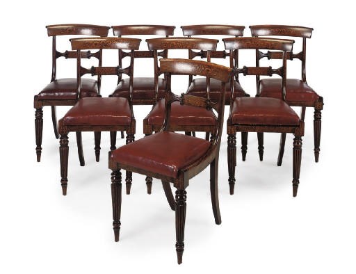 A SET OF EIGHT LATE REGENCY SIMULATED ROSEWOOD AND INLAID DINING CHAIRS