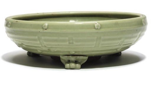 A Chinese celadon glazed tripod bulb bowl
