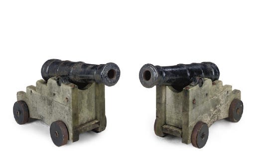 A PAIR OF CAST IRON CANNON