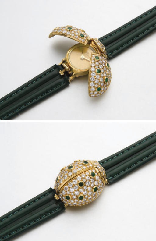 MONTRE BRACELET DE DAME COCCINELLE EMERAUDES ET DIAMANTS, PAR POIRAY