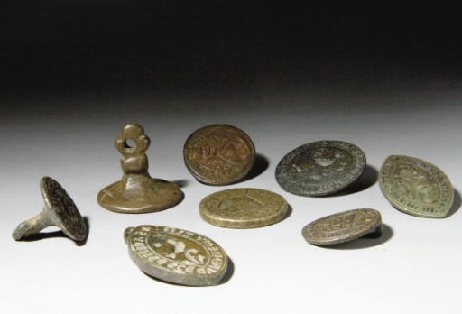 ONZE MATRICES EN BRONZE