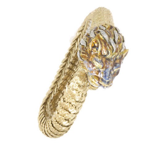AN 18K GOLD AND ENAMEL LION BRACELET