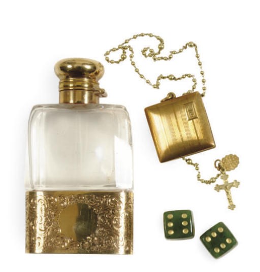 AN AMERICAN GOLD-MOUNTED SCENT BOTTLE WITH HINGED COVER AND A GOLD LOCKET AND ROSARY,