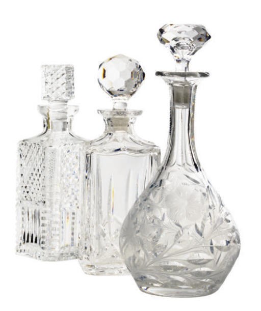 A GROUP OF SIX AMERICAN GLASS DECANTERS AND STOPPERS,