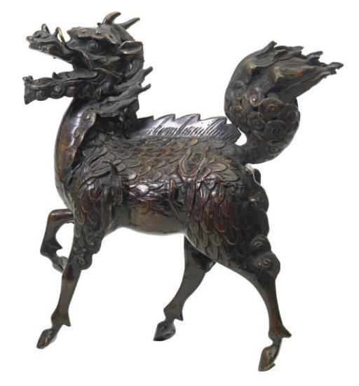 A CHINESE BRONZE FIGURE OF A KYLIN,