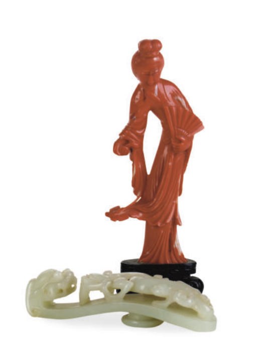 A CHINESE WHITE JADE DRAGON-SHAPED BELT HOOK AND A RED CORAL FIGURE OF A MEIREN,**