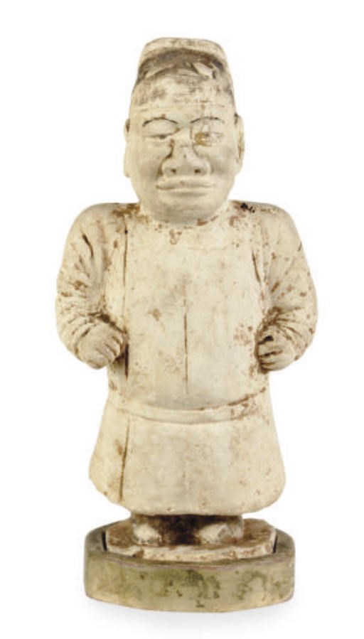 A CHINESE POTTERY FIGURE OF A FOREIGN DWARF,