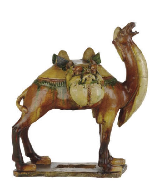 A CHINESE SANCAI-GLAZED FIGURE OF A CAMEL,