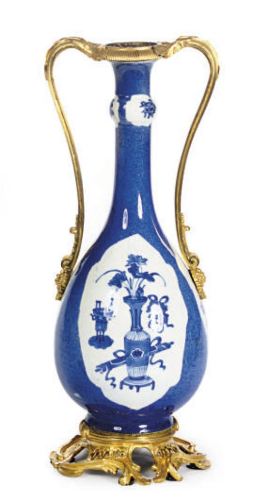 A GILT METAL-MOUNTED CHINESE PORCELAIN BLUE AND WHITE BOTTLE VASE,