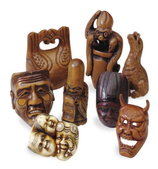 SEVEN JAPANESE WOOD AND AN IVORY NETSUKE,**