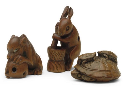 THREE JAPANESE WOOD NETSUKE,**