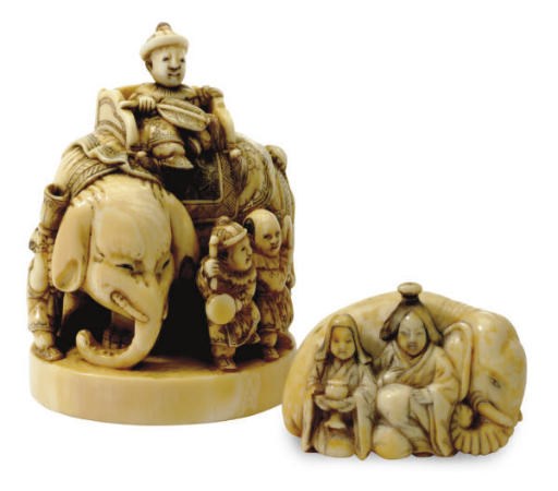 TWO JAPANESE IVORY NETSUKE**,