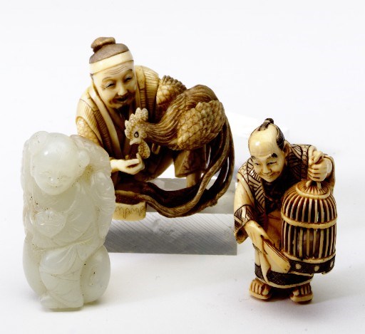 TWO JAPANESE IVORY NETSUKE,**