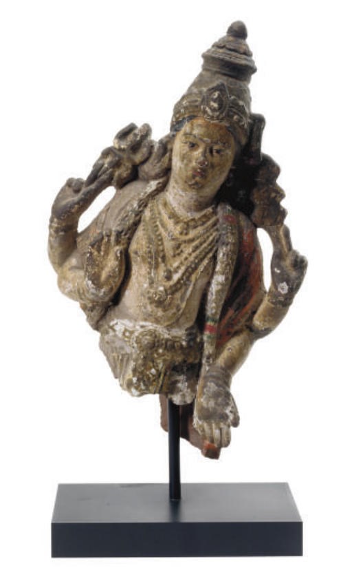 AN INDIAN POTTERY POLYCHROME-PAINTED FIGURE OF KRISHNA,
