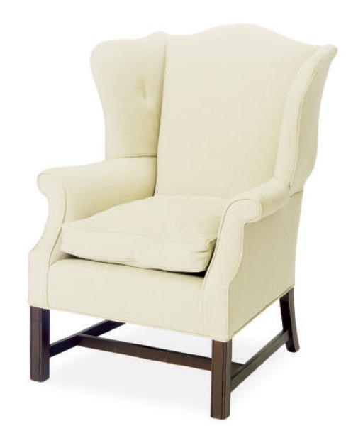A STAINED WOOD AND UPHOLSTERED WINGBACK ARMCHAIR,
