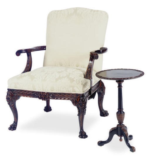 AN ENGLISH CARVED MAHOGANY ARMCHAIR,