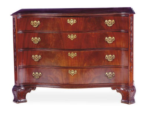 A MAHOGANY SERPENTINE CHEST-OF-DRAWERS,