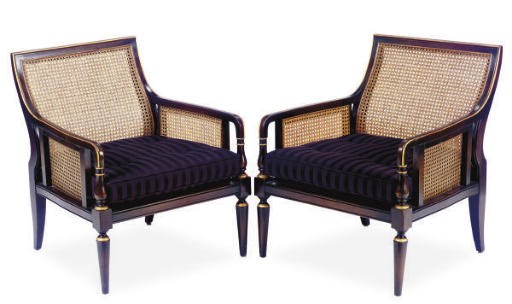 A PAIR OF EBONIZED, PARCEL-GILT, AND CANED LOW ARMCHAIRS,