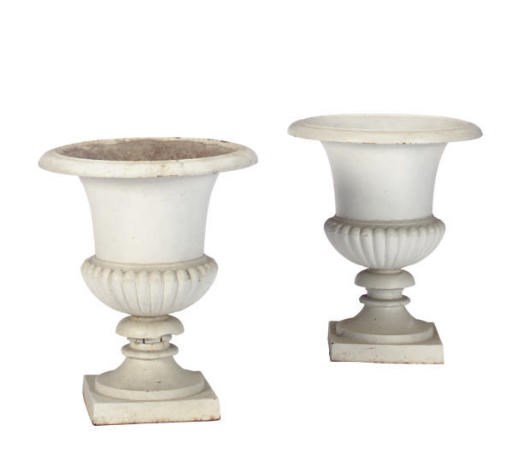 A PAIR OF WHITE-PAINTED CAST IRON GARDEN URNS,