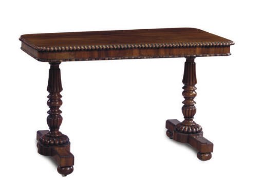 A GEORGE IV GONCALO-ALVES WRITING-TABLE,