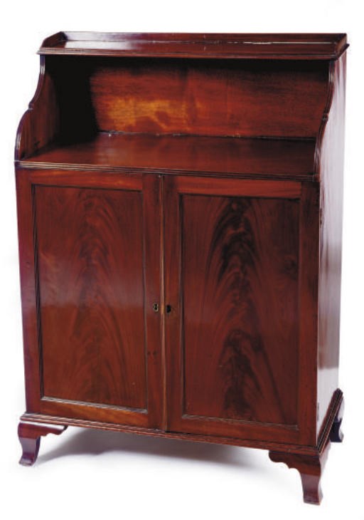 A GEORGE III MAHOGANY 'WATERFALL' BOOKCASE,