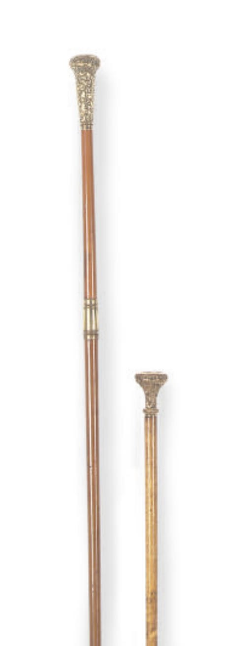 A GILT-METAL MOUNTED FRUITWOOD WALKING STICK,