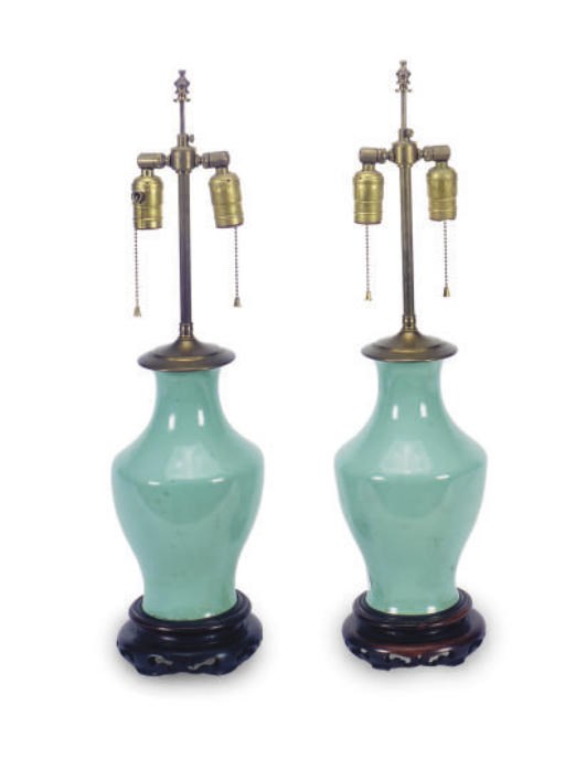 A PAIR OF CELADON PORCELAIN VASES MOUNTED AS LAMPS,