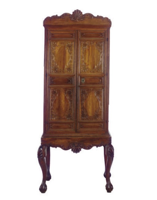 A SOUTH AMERICAN HARDWOOD CABINET-ON-STAND,