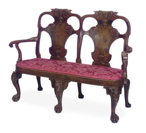 AN ENGLISH WALNUT DOUBLE-CHAIRBACK SETTEE,