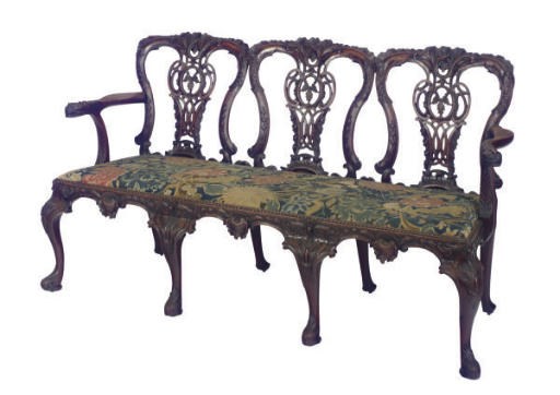 AN ENGLISH WALNUT TRIPLE-CHAIRBACK SETTEE,