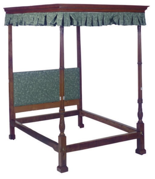 AN ENGLISH GOTHIC REVIVAL OAK AND MAHOGANY BED,