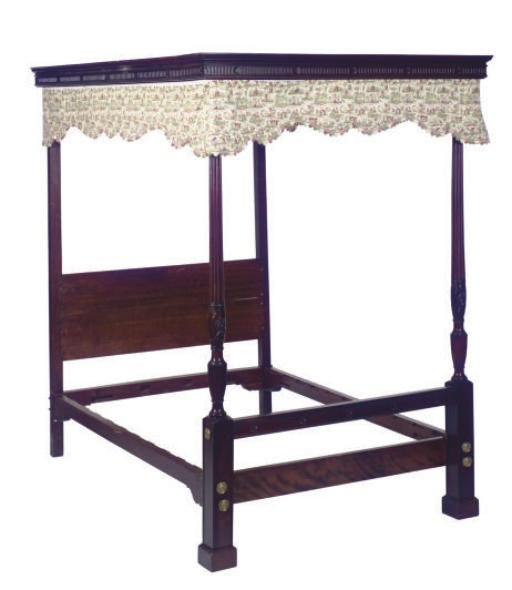 A MAHOGANY AND OAK BED,
