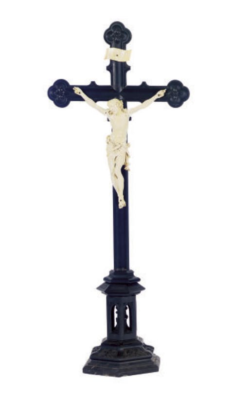 A BONE AND EBONIZED CRUCIFIX,