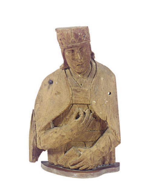 AN OAK CARVED FIGURE OF A SAINT,
