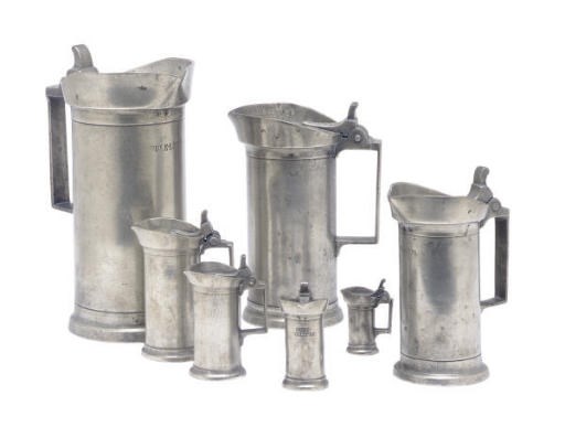A SET OF SIX PEWTER MEASURES,