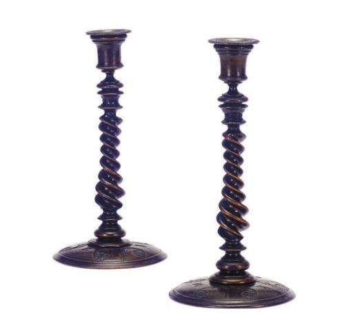 A PAIR OF VICTORIAN WALNUT CANDLESTICKS,