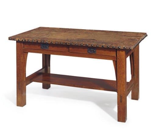 AN OAK AND LEATHER TWO-DRAWER LIBRARY TABLE,