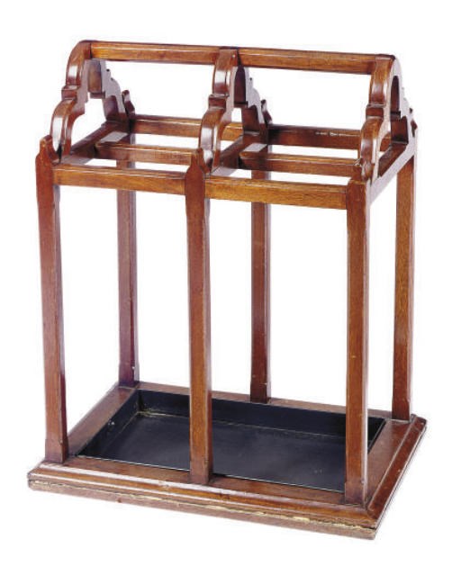 AN ENGLISH WALNUT UMBRELLA STAND,