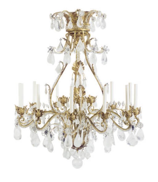 A GILT-METAL AND ROCK CRYSTAL TWELVE-LIGHT CHANDELIER,