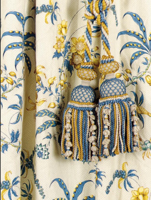 A SELECTION OF YELLOW, BLUE ON IVORY GROUND FRUIT AND VINE PATTERN CURTAINS,