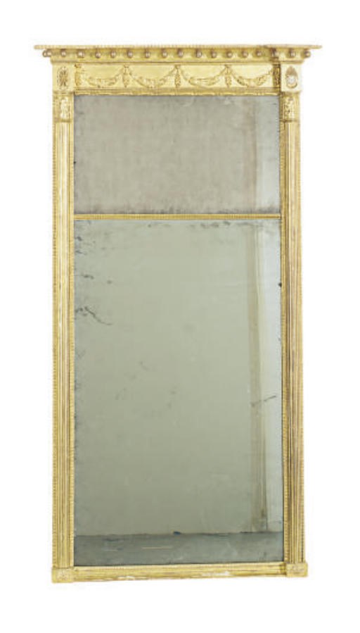 A REGENCY GILTWOOD AND GILT-COMPOSITION PIER MIRROR,