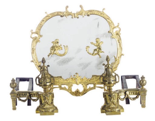 A PAIR OF BRASS ANDIRONS AND A GILT-METAL FIRESCREEN,