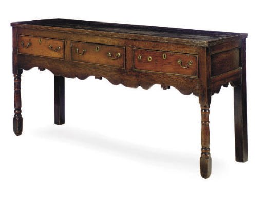 A GEORGIAN OAK DRESSER BASE,