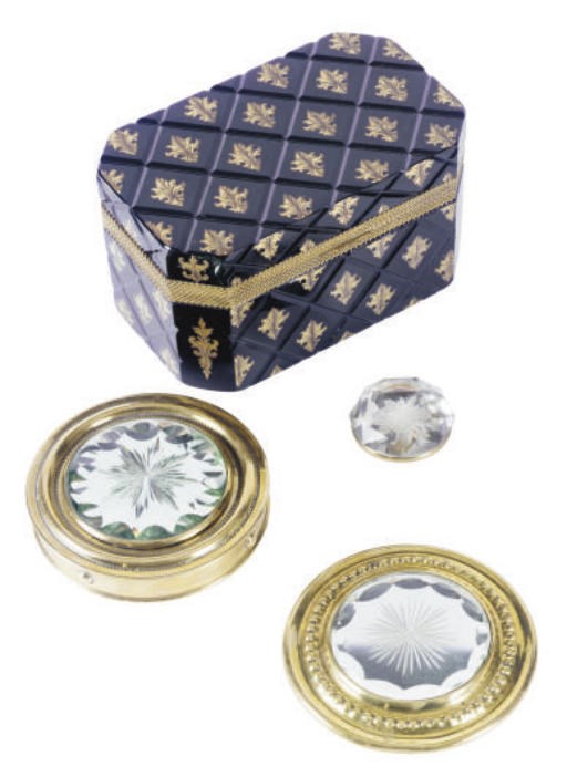 A BLACK GLASS AND PARCEL-GILT TABLE-TOP BOX,