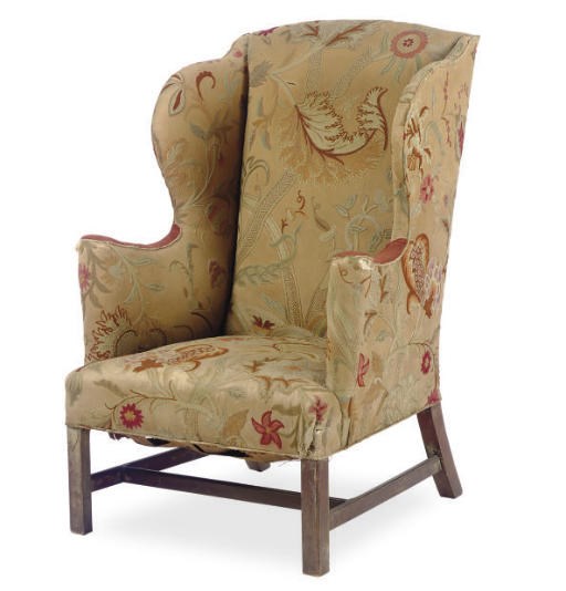 A GEORGE III MAHOGANY AND UPHOLSTERED WINGBACK ARMCHAIR,