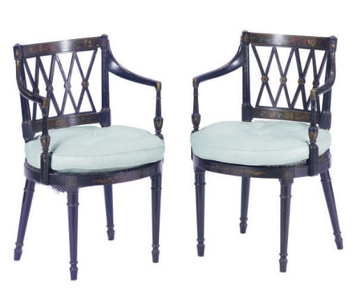 A PAIR OF ENGLISH EBONIZED, PAINT-DECORATED AND CANED OPEN ARMCHAIRS,