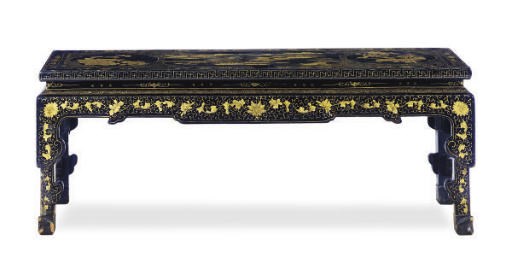A BLACK AND GILT-LACQUERED COFFEE TABLE,