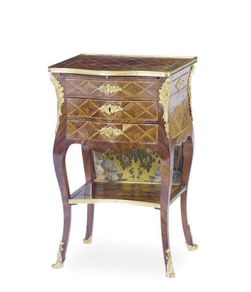 A FRENCH GILT-METAL MOUNTED KINGWOOD, TULIPWOOD AND ROSEWOOD TABLE EN CHIFFIONIERE**,